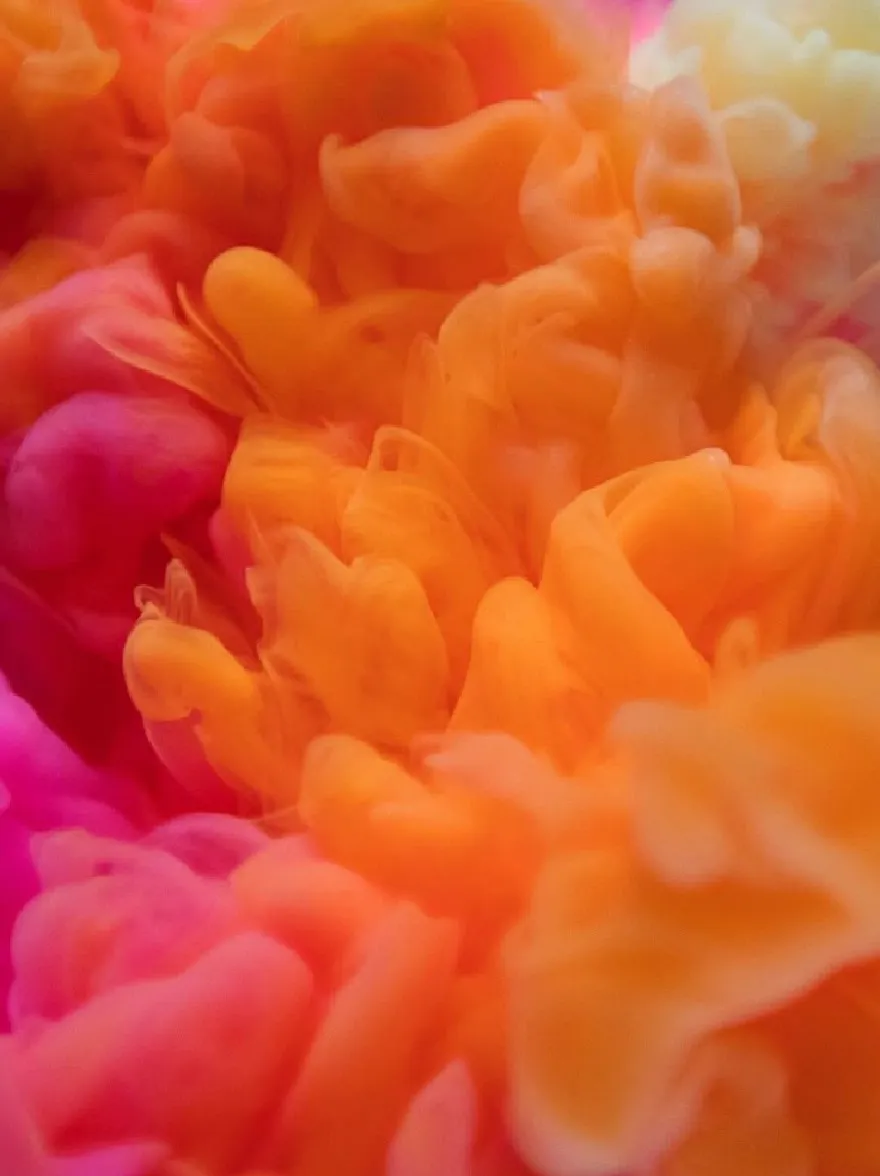 Русский промпт: A close-up shot of a vibrant, abstract background composed of a mix of orange, pink, yellow, and white ink in water. The colors blend together seamlessly, creating a mesmerizing effect. The texture of the ink is smooth and fluid, with the orange and pink hues blending seamlessly into the black background. The image has a soft, dreamy quality, with a shallow depth of field that highlights the intricate details of the colors. The overall effect is a captivating and dynamic composition that captures the essence of creativity and exploration. | Original prompt: A close-up shot of a vibrant, abstract background composed of a mix of orange, pink, yellow, and white ink in water. The colors blend together seamlessly, creating a mesmerizing effect. The texture of the ink is smooth and fluid, with the orange and pink hues blending seamlessly into the black background. The image has a soft, dreamy quality, with a shallow depth of field that highlights the intricate details of the colors. The overall effect is a captivating and dynamic composition that captures the essence of creativity and exploration.