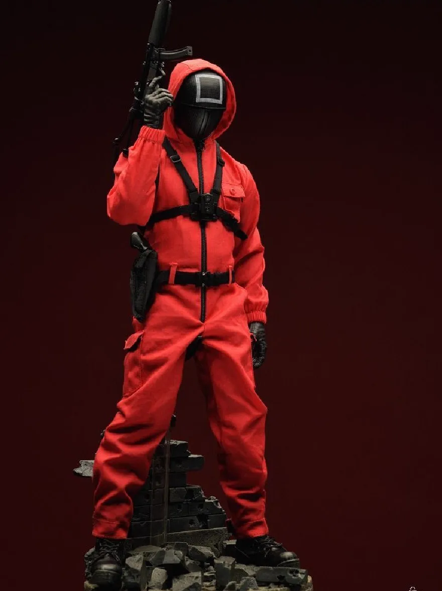 Русский промпт: Фотография человека в красном комбинезоне с черной маской, держащей винтовку, стоящую на куче обломков. Фон темный, с твердым красным цветом. Человек расположен в центре изображения, лицом к зрителю. Он носит черные перчатки и имеет пистолет в правой руке. Компания имеет молнию вниз по передней части и ремень вокруг его талии. Изображение высококачественное с матовой отделкой и водяным знаком в правом нижнем углу. | Original prompt: Photo of a man in a red jumpsuit with a black mask, holding a rifle, standing on a pile of rubble. The background is dark, with a solid red color. The man is positioned in the center of the image, facing the viewer. He is wearing black gloves and has a gun in his right hand. The jumpsuit has a zipper down the front and a belt around his waist. The image is high quality with a matte finish and a watermark in the bottom right corner.