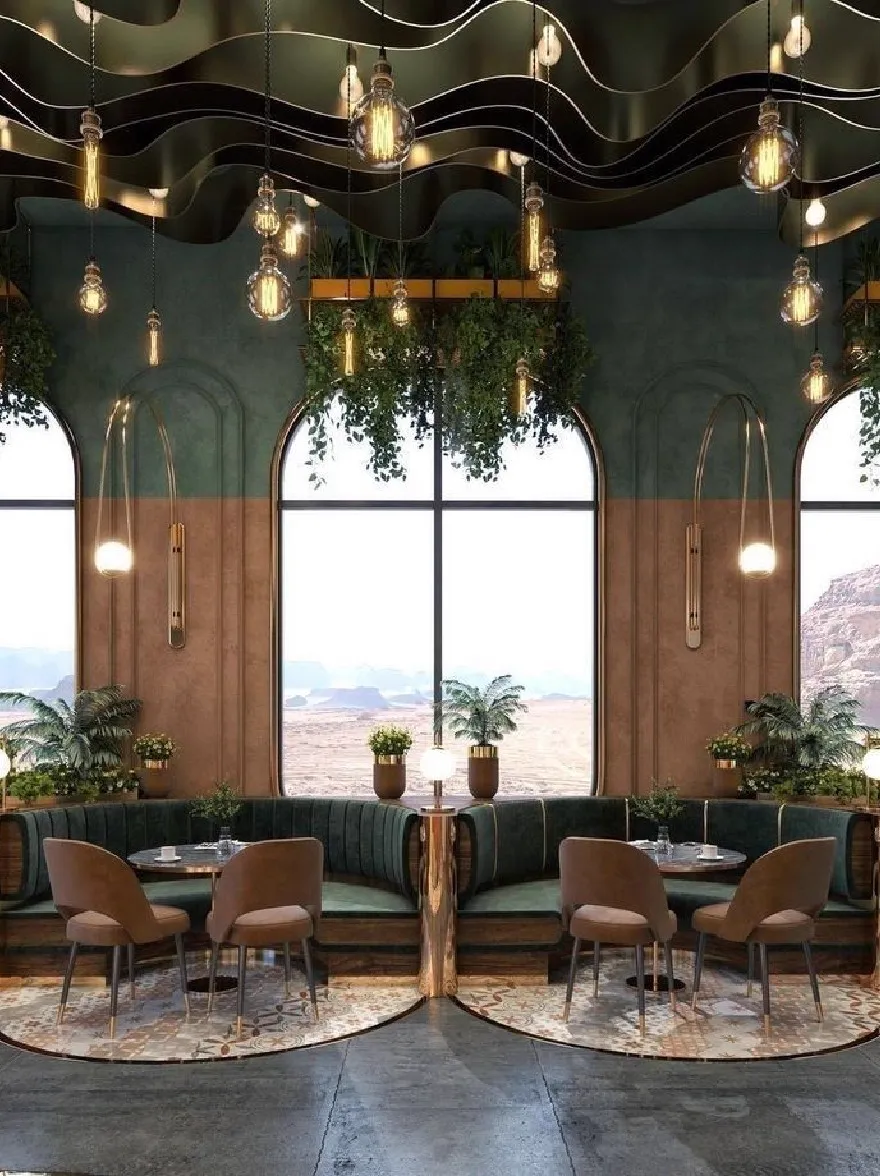 Русский промпт: Рендеринг современного интерьера кафе с деревенским, промышленным ощущением. Стены окрашены в темно -зеленый цвет, а потолок украшен подвесными лампочками и зеленью. В центре есть круглый деревянный стол, окруженный зеленым бархатным диваном и несколькими коричневыми кожаными стульями. По обе стороны от стола есть горшечные растения, добавляя прикосновение зелени в пространство. Большие окна предлагают потрясающий вид на пустынный ландшафт на улице, с холмистой местностью и далекой горной цепей на расстоянии. Общая атмосфера уютная и привлекательная, идеально подходит для расслабляющих и развлекательных гостей. | Original prompt: A rendering of a modern cafe interior with a rustic, industrial feel. The walls are painted in a dark green color, and the ceiling is adorned with hanging light bulbs and greenery. The room has a circular wooden table in the center, surrounded by a green velvet sofa and several brown leather chairs. On either side of the table, there are potted plants, adding a touch of greenery to the space. The large windows offer a stunning view of the desert landscape outside, with rolling hills and a distant mountain range in the distance. The overall atmosphere is cozy and inviting, perfect for relaxing and entertaining guests.