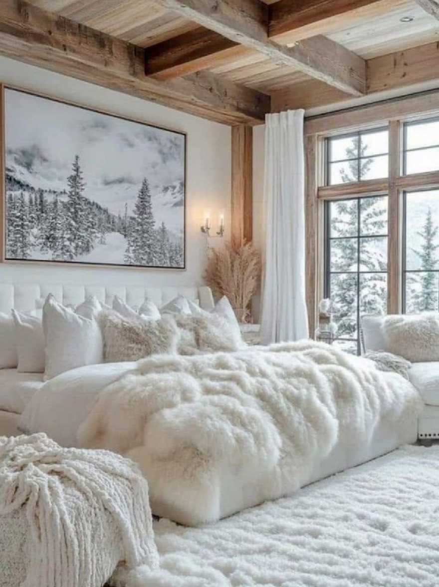 Русский промпт: Уютная, деревенская спальня с большим окном с видом на снежный пейзаж. Стены сделаны из дерева, а потолок изготовлен из балок, что дает комнате теплую и уютную атмосферу. Кровать покрыта пушистым белым постельным бельем и подушками, а под ним есть большой белый коврик. На стене над кровати находится зимняя пейзажная картина в рамке, добавляя в комнату прикосновение тепла и изысканности. Комната украшена естественным светом, проходящим через большое окно, которое предлагает вид на снежный пейзаж снаружи. Общая эстетика уютная и привлекательная, идеально подходит для зимней страны чудес. | Original prompt: A cozy, rustic bedroom with a large window overlooking a snowy landscape. The walls are made of wood, and the ceiling is made of beams, giving the room a warm and cozy atmosphere. The bed is covered with fluffy white linens and pillows, and there is a large white rug beneath it. On the wall above the bed is a framed winter landscape painting, adding a touch of warmth and sophistication to the room. The room is decorated with natural light coming through the large window, which offers a view of the snowy landscape outside. The overall aesthetic is cozy and inviting, perfect for a winter wonderland.