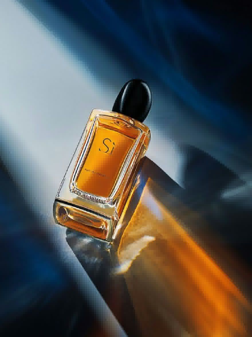 Русский промпт: Фотография духовной бутылки с черной крышкой, расположенной на отражающей поверхности. Бутылка имеет прямоугольную форму с золотой меткой, которая читает «Si» в курсивом шрифте. Фон представляет собой градиент синих и оранжевых оттенков, создавая мягкое, эфирное сияние. Освещение мягкое и рассеянное, набрав теплое сияние на бутылке. Общий эффект - это роскошь и изощренность. | Original prompt: A photograph of a perfume bottle with a black cap, placed on a reflective surface. The bottle is rectangular in shape with a gold label that reads "Si" in a cursive font. The background is a gradient of blue and orange hues, creating a soft, ethereal glow. The lighting is soft and diffused, casting a warm glow on the bottle. The overall effect is one of luxury and sophistication.