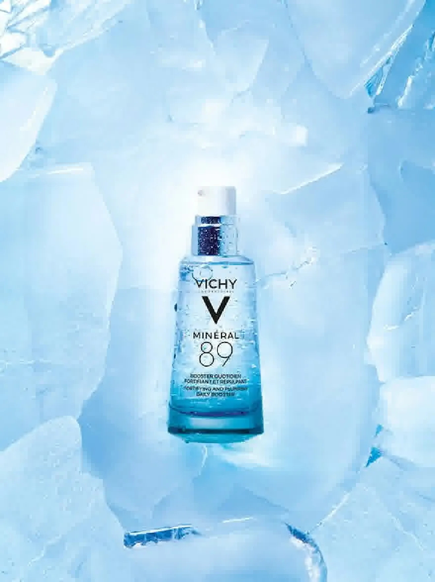 Русский промпт: Бутылка виши минерала 89 на синем ледяном фоне. Бутылка имеет цилиндрическую форму с белой крышкой и синей меткой. На лейбле есть название бренда «Vichy», написанную жирными черными буквами наверху, за которым следует название продукта «Минерал 89» в меньших белых буквах. Фон состоит из крупных, нерегулярно формированных кубиков льда, что придает изображению замороженное, ледяное ощущение. Изображение имеет высококачественный, профессиональный вид с акцентом на продукт. | Original prompt: A bottle of Vichy Mineral 89 Water on a blue ice background. The bottle is cylindrical in shape with a white cap and a blue label. The label has the brand name "Vichy" written in bold black letters at the top, followed by the product name "Mineral 89" in smaller white letters. The background is composed of large, irregularly shaped ice cubes, giving the image a frozen, icy feel. The image has a high-quality, professional look with a focus on the product.